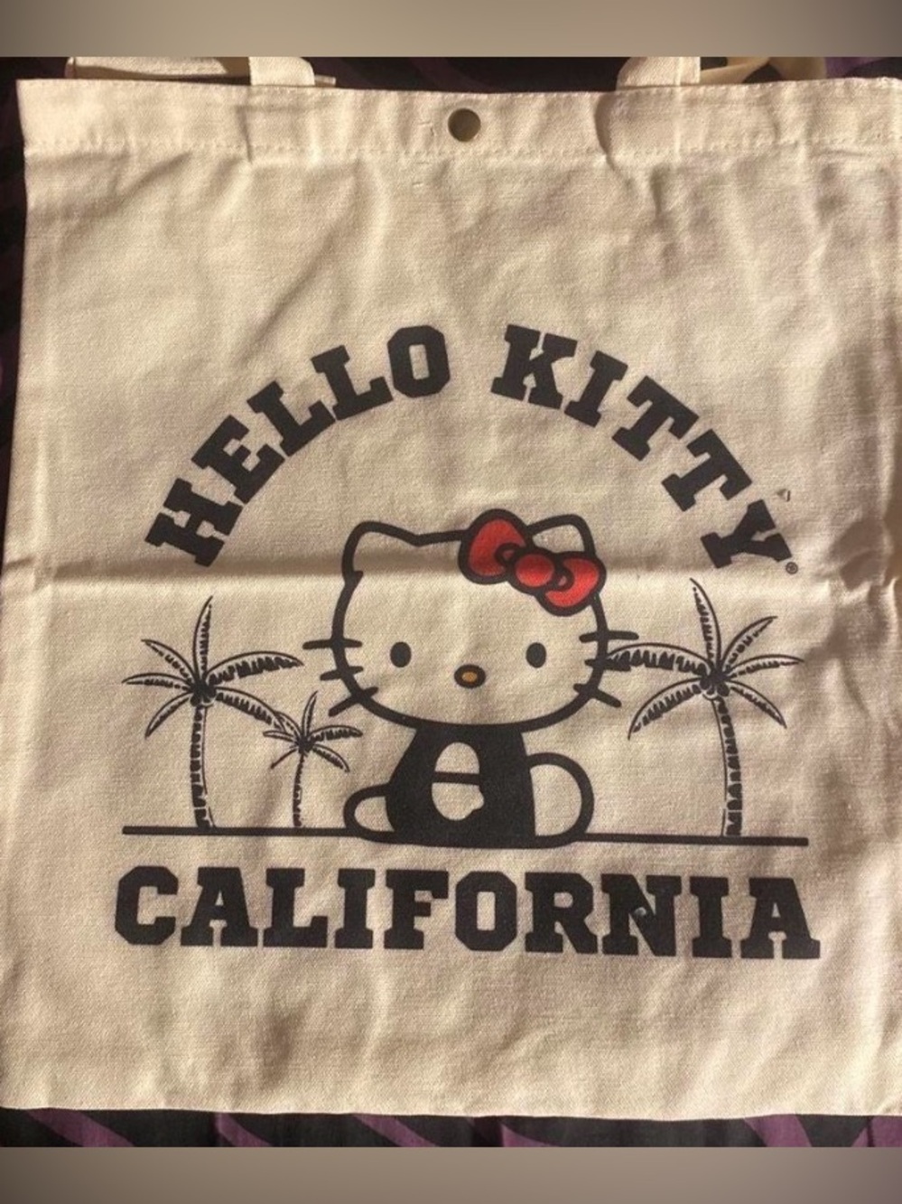 Sanrio Hello Kitty Canvas Tote in Cream with Black Text & Red Bow